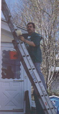 Joe, painting during the Christmas in April project